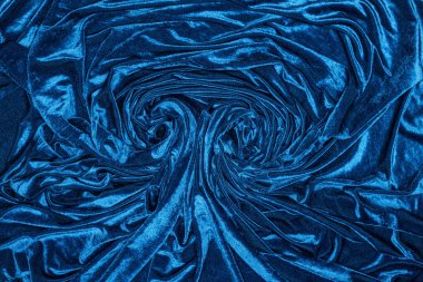 Top view of background of wavy blue velvet cloth clipart