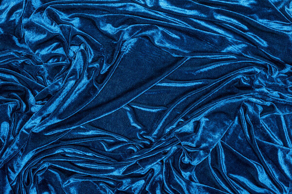 Top view of background of blue velour fabric 
