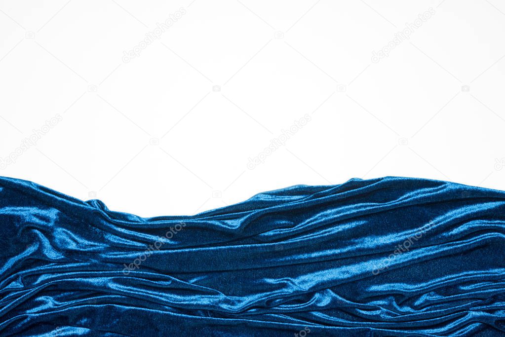 Top view of blue velour cloth isolated on white