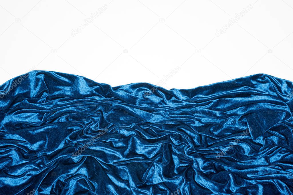 Top view of blue velvet fabric isolated on white
