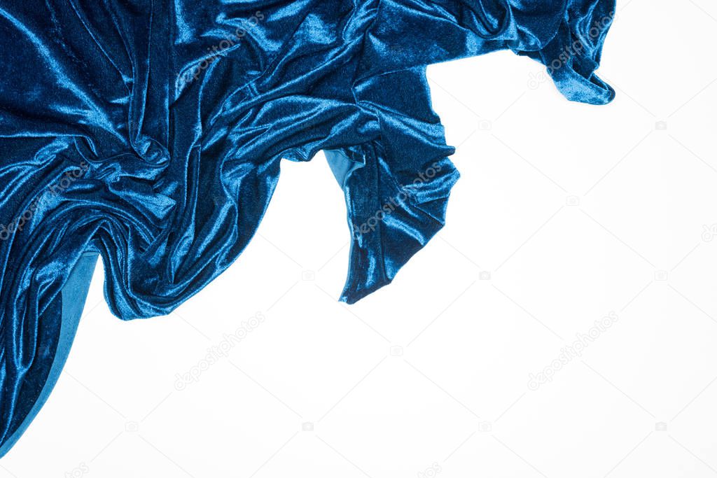 Top view of blue velvet fabric isolated on white with copy space