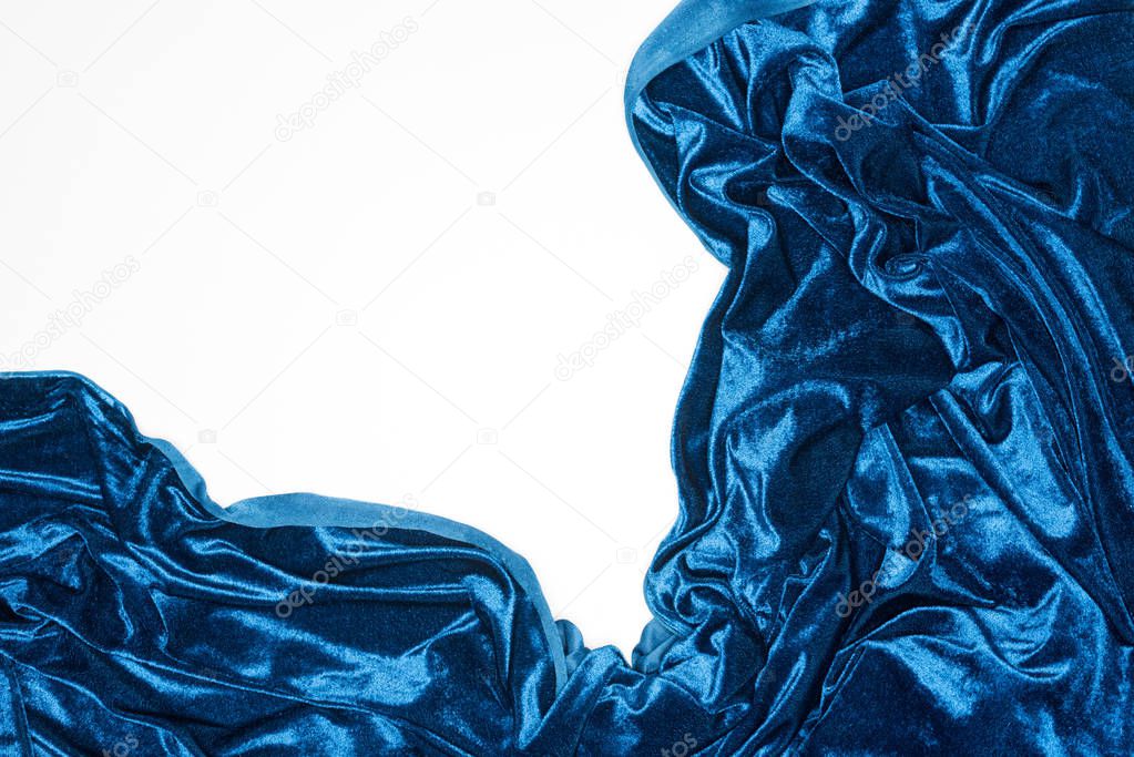 Top view of crumpled blue velour isolated on white