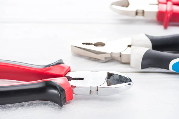 Close View Metal Pliers White Wooden Surface — 스톡 사진
