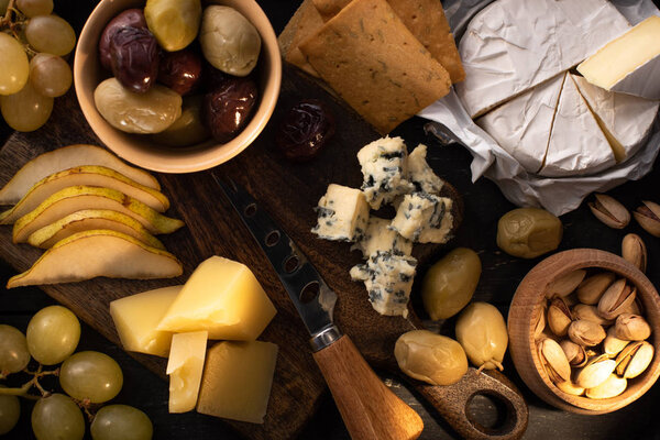 Top view of food composition on wooden background