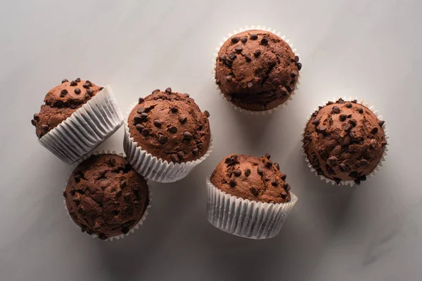 Top View Fresh Chocolate Muffins Marble Surface — Stok fotoğraf