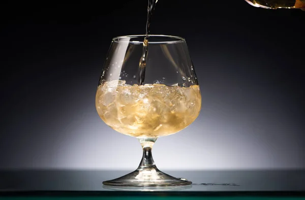 Whiskey Pouring Transparent Glass Ice Dark Back Light — Stock Photo, Image