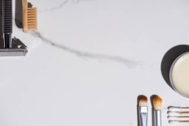 Top view of cosmetic brushes, toothbrush, razor, jar of wax and ear sticks on white background, zero waste concept clipart