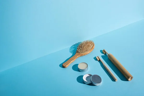 Hair Brush Jars Wax Tooth Powder Toothbrushes Blue Background Zero — Stock Photo, Image