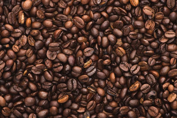 焼き立てコーヒー豆の上からの眺め背景 — ストック写真