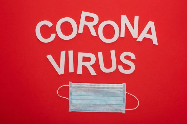 Top View Medical Mask Coronavirus Lettering Isolated Red — Stock Photo, Image