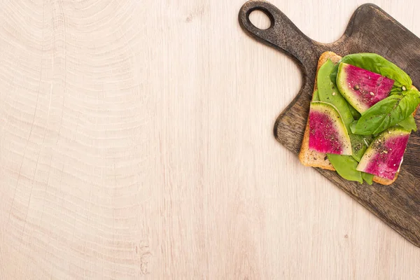 Top View Vegetarian Radish Sandwich Wooden Cutting Board — Stock Photo, Image