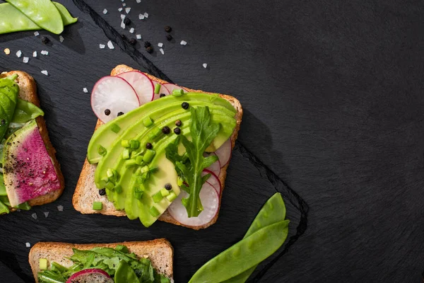 Top View Organic Sandwiches Radish Avocado Stone Board Pepper Salt — Stock Photo, Image