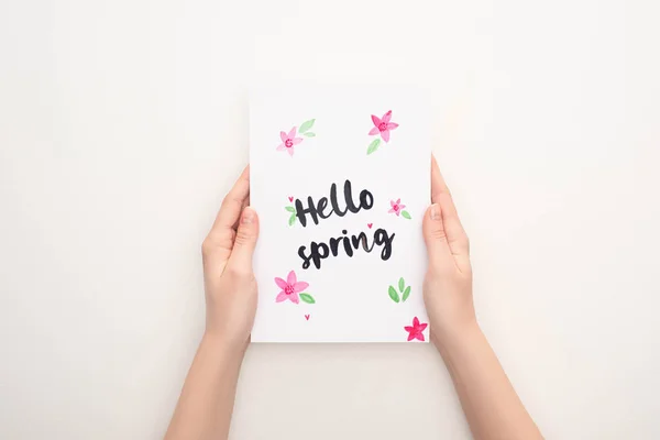 Cropped View Woman Holding Card Hello Spring Lettering White Background — Stock Photo, Image