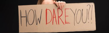 Panoramic view of woman holding placard with how dare you lettering isolated on black, global warming concept clipart