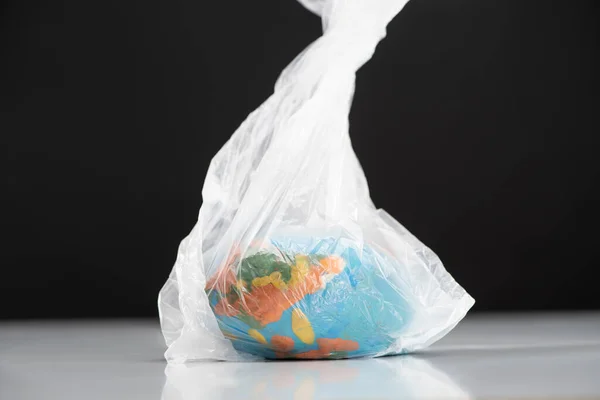 Plasticine Globe Plastic Bag Isolated Black Global Warming Concept — Stock Photo, Image