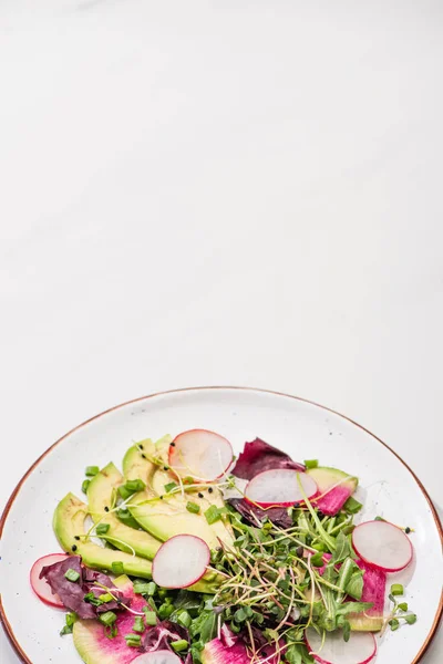 Fresh Radish Salad Greens Avocado Plate White Surface — Stock Photo, Image