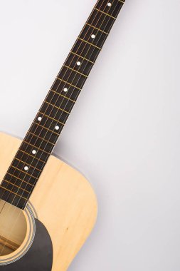 Top view of acoustic guitar on white background clipart