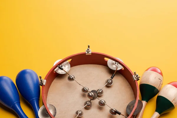 Close View Tambourine Colorful Blue Maracas Yellow Background — Stock Photo, Image