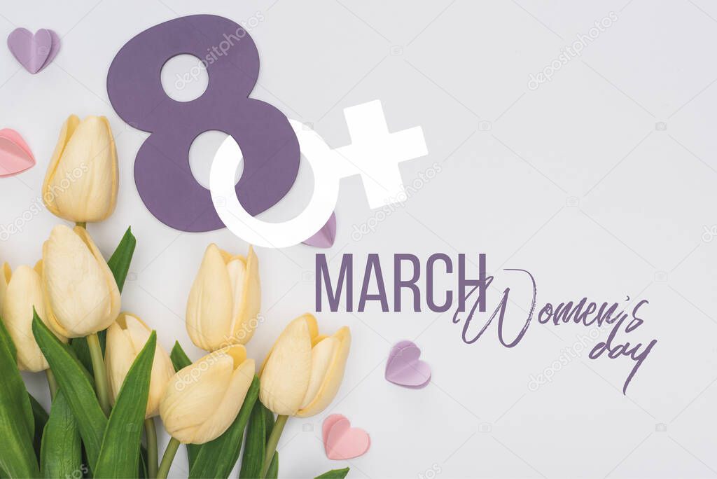 top view of tulips, paper hearts and number 8 isolated on white, international womens day illustration