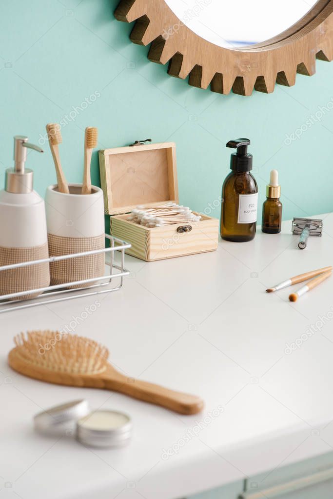 Selective focus of various beauty and hygiene products in bathroom, zero waste concept