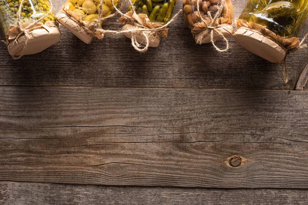 Top View Homemade Tasty Pickles Jars Wooden Table Copy Space — Stock Photo, Image