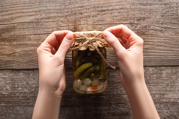 Cropped View Woman Holding Bow Homemade Tasty Canned Cucumbers Jar — Stock Photo, Image