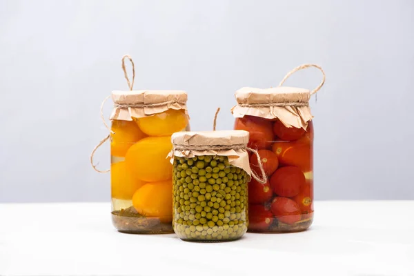 Homemade Delicious Pickled Tomatoes Green Peas Jars Isolated Grey — Stock Photo, Image
