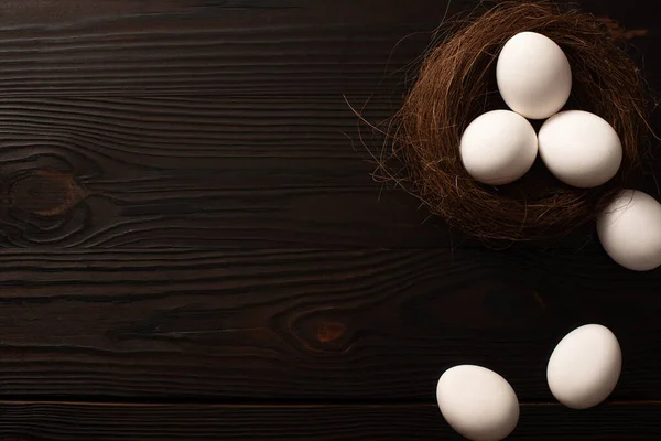 Top View White Chicken Eggs Nest Brown Wooden Background — Stock Photo, Image