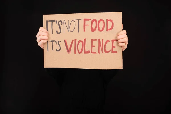 Partial View Woman Holding Cardboard Sign Its Food Its Violence — Stock Photo, Image