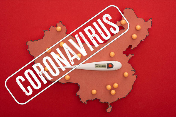 Top view of thermometer on map of china with push pins on red background with coronavirus illustration
