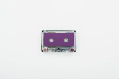 top view of purple cassette isolated on white  clipart