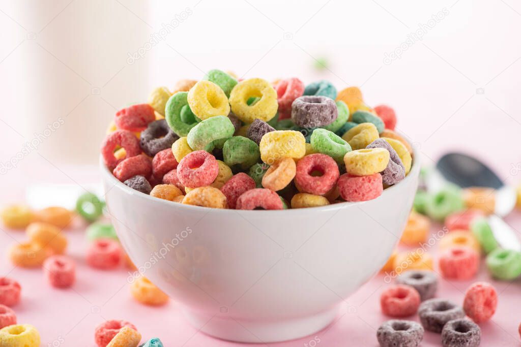 selective focus of bright multicolored breakfast cereal in bowl