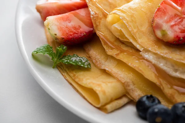 Close View Tasty Crepes Blueberries Strawberries Mint Plate — Stock Photo, Image