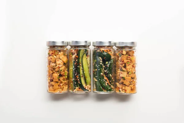 Top view of cucumber and daikon radish kimchi in jars on white background — Stock Image Top View Cucumber Daikon Radish Kimchi Jars White Background Stock Image