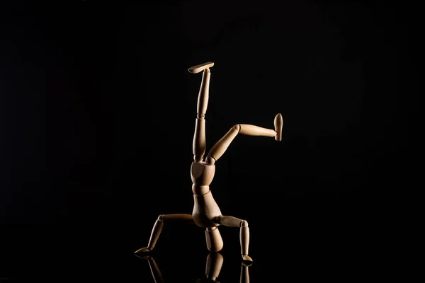 Wooden Doll Headstand Position Black Background — Stock Photo, Image