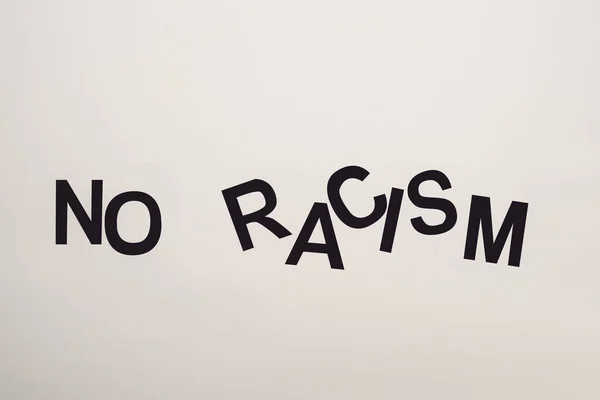 Top View Black Racism Lettering Isolated White — Stock Photo, Image