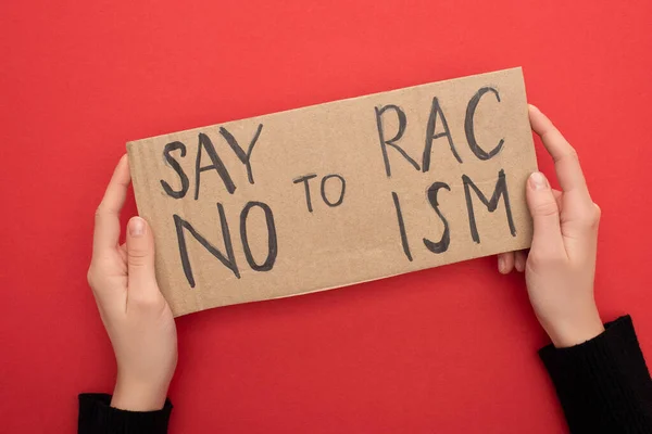 Cropped View Woman Holding Carton Placard Say Racism Lettering Red — Stock Photo, Image