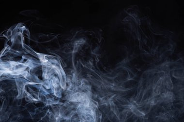 white flowing smoke cloud on black background with copy space clipart