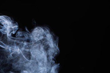 white flowing smoke cloud on black background with copy space clipart