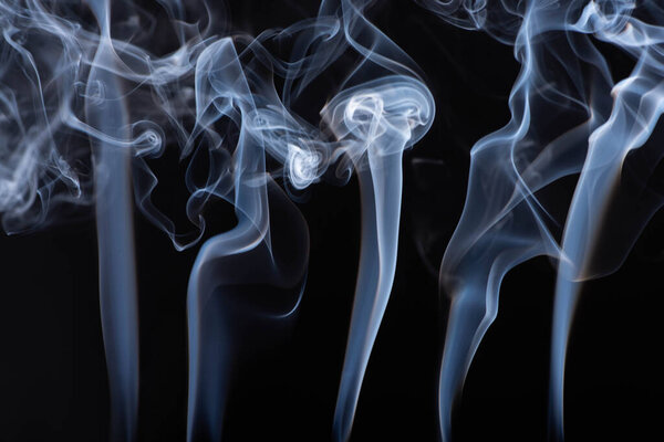 abstract white flowing smoke on black background