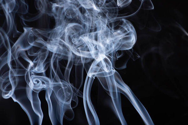 abstract white flowing smoke on black background