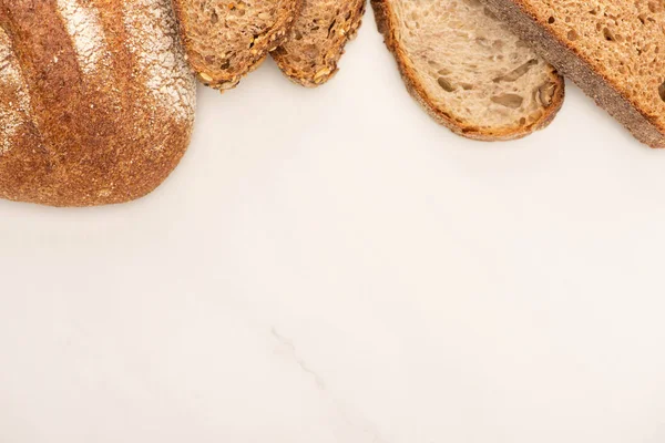 Top View Fresh Brown Bread Slices White Background — Stock Photo, Image