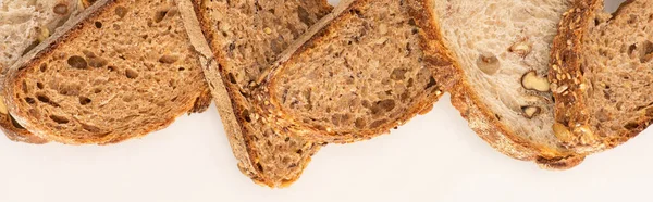 Vrchní Pohled Plátky Celozrnného Chleba Bílém Pozadí Panoramatický Výstřel — Stock fotografie