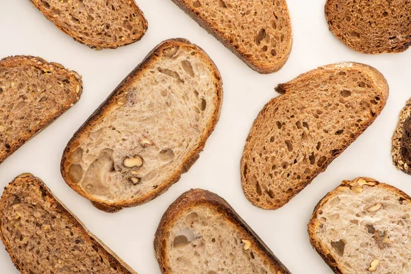 Vista Dall Alto Gustose Fette Pane Integrale Sfondo Bianco — Foto Stock