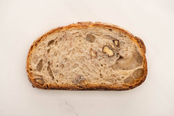 top view of fresh whole wheat bread slice on white background