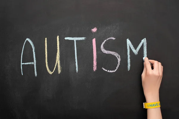 Partial View Woman Writing Word Autism Chalkboard — Stock Photo, Image