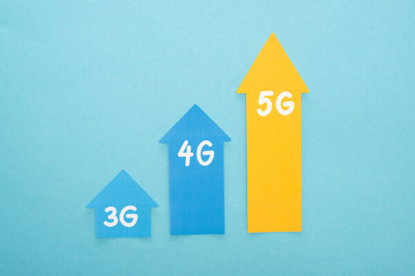 top view of 3g, 4g and 5g arrows on blue background