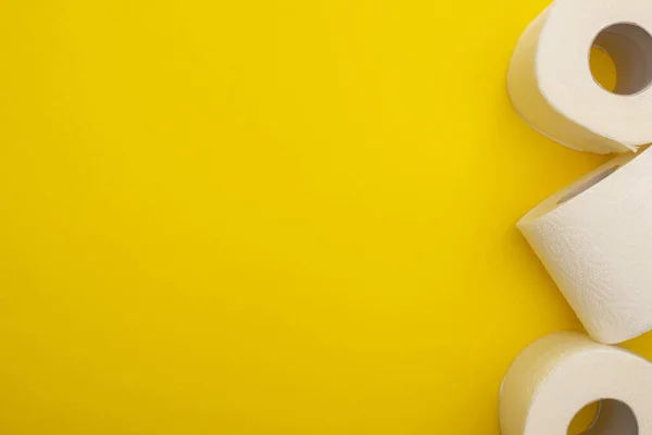 Top View Clean Toilet Paper Rolls Yellow Background Copy Space — Stock Photo, Image