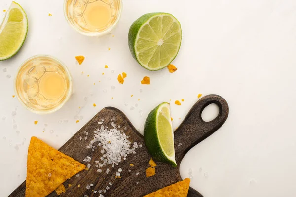 Top View Golden Tequila Shot Glasses Lime Salt Nachos Wooden — Stock Photo, Image
