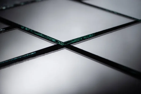 Nahaufnahme Von Quadratischen Spiegelstücken — Stockfoto